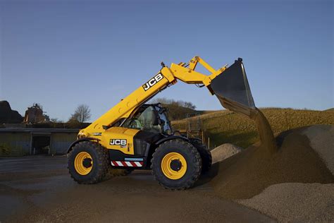 Thematic photo of JCB 541-70 telescopic loader working on a farm or construction site
