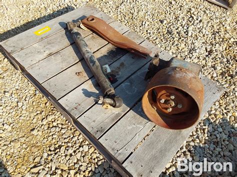 Detailed photo of the power take-off (WOM) or belt pulley attachment on a T-25 tractor