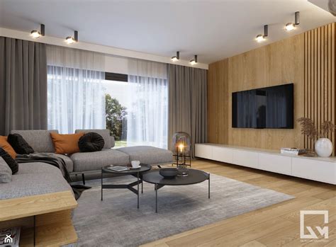 Zdjęcie salonu dealerskiego JCB z prezentacją różnych modeli maszyn