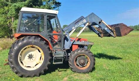 Zetor tractor with front loader working on a farm