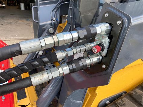 Diagram showing a quick hydraulic coupler system