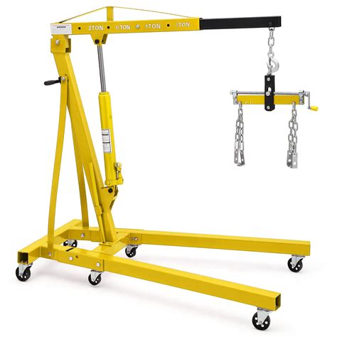 Thematic photo of a workshop crane lifting an engine