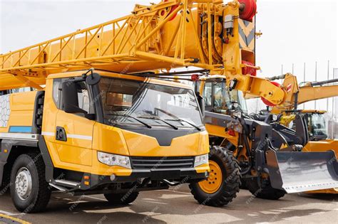 Thematic photo of a large self-propelled crane in action on a construction site
