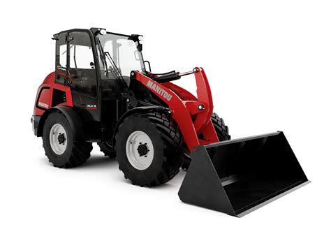 Photo of a Manitou MLA articulated loader in an agricultural setting