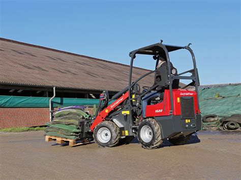 Photo of Schäffer compact loader (SLT version) working inside a low-ceiling building