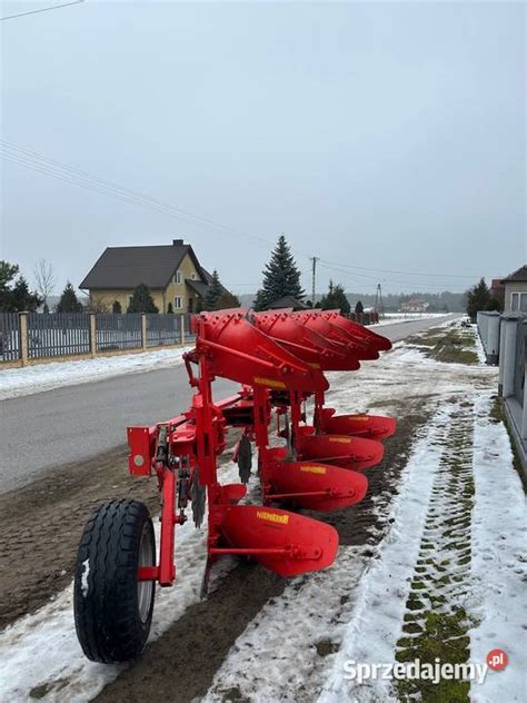 Pług obrotowy Kverneland Niemeyer Alphatop 80 Variant w polu podczas pracy
