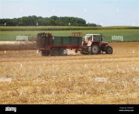 Thematic photo of HAWE muck spreader working in the field