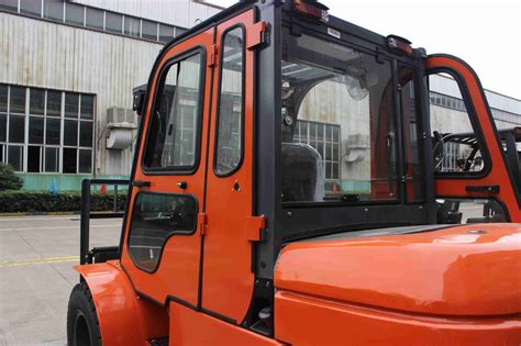 Thematic photo of a forklift cabin with a focus on the side window
