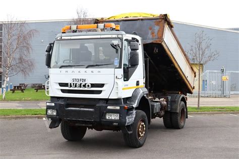 Thematic photo of a MAN 4x4 tipper truck with a mounted HDS