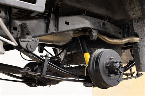 Scheme of a tandem chassis with parabolic springs
