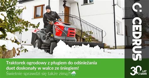 Zdjęcie traktorka ogrodowego Cedrus z zamontowanym pługiem do odśnieżania