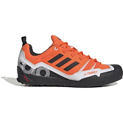 Thematic photo of adidas Terrex Solo shoes in a mountain landscape