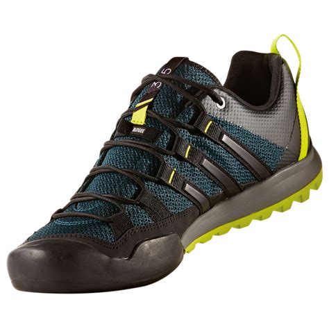 Photo of a person climbing in adidas Terrex Solo shoes
