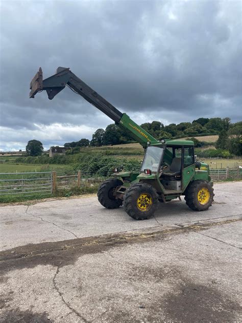 fotografia ładowarki John Deere 4400 z 1996 roku