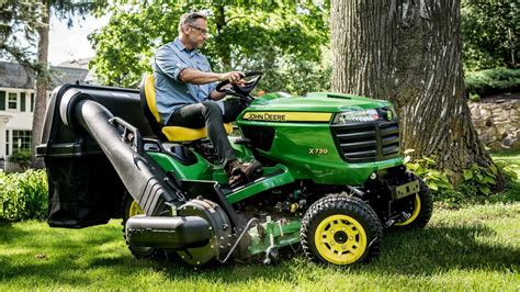 Thematic photo of a garden tractor working on a large lawn