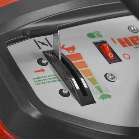 Detailed photo of the engine and control panel of the Hecht 5176 tractor mower