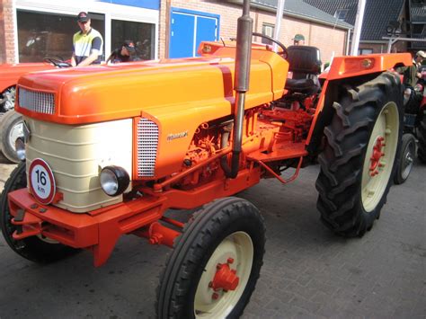 Thematic photo of a vintage Renault Master 1 tractor on a field