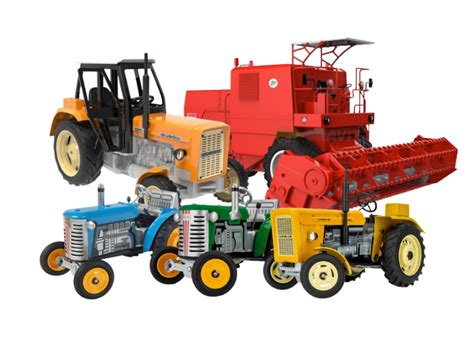 Różne modele traktorów Snapper obok siebie w ogrodzie