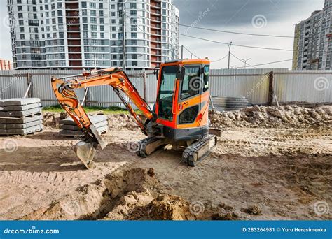 Thematic photo of a mini excavator working on a construction site in Czeladź