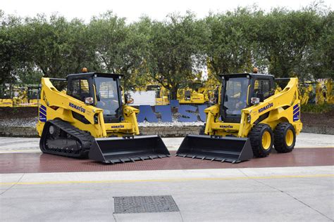 The Komatsu CK50-8E0 compact track loader in action, showing its versatility
