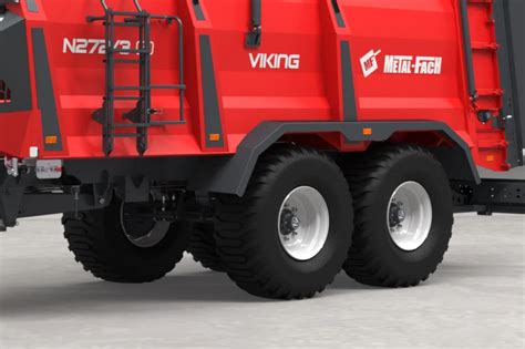 Widok na podwozie typu tandem z resorami parabolicznymi w rozrzutniku Metal-Fach N272/3 VIKING.