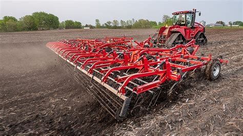 Thematic photo of a tractor cultivator working in the field
