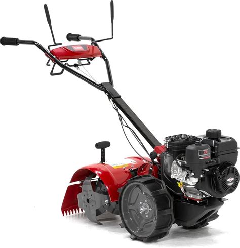 Thematic photo of a person using a garden tiller with a Briggs & Stratton engine