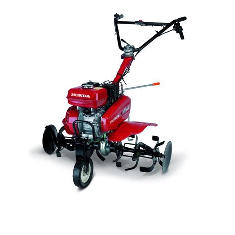 Glebogryzarka Honda FJ 500 DER w akcji, spulchniająca glebę w ogrodzie