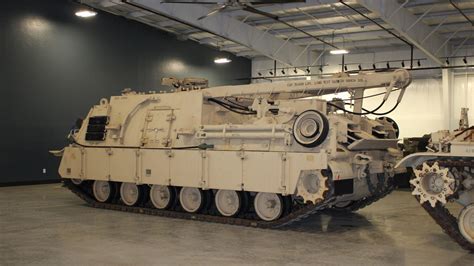 Infographics showing the technical specifications and capabilities of the M88A2 Hercules recovery vehicle