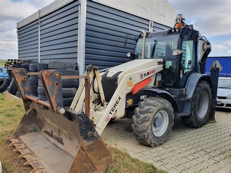 zdjęcie koparko-ładowarki Terex TLB w akcji