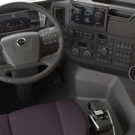 Wnętrze kabiny Volvo FMX z wyświetlaczem monitorującym obciążenie osi