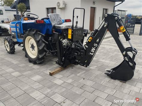 schemat techniczny montażu zamiatarki przedniej na ramie ciągnika ISEKI