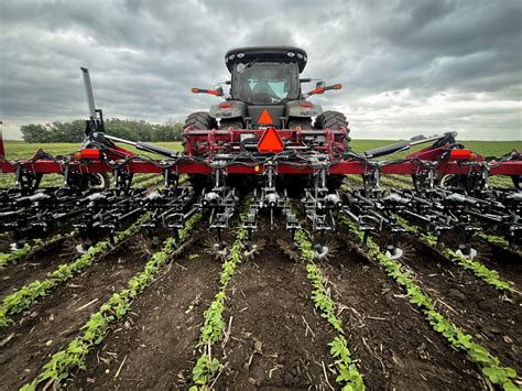Thematic photo of a modern cultivator working in the field