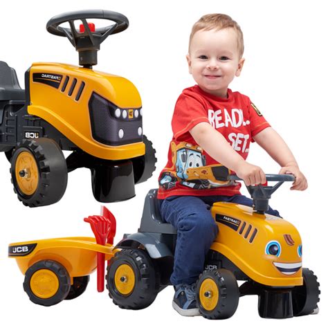 zdjęcie jeździka Falk JCB z dzieckiem