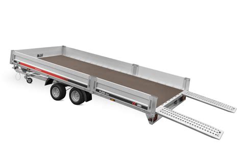 Zdjęcie przyczepy wywrotki z otwartymi burtami aluminiowymi i nisko umieszczonymi kołami