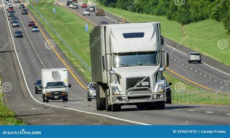Thematic photo of a modern Volvo semi-trailer truck on a highway