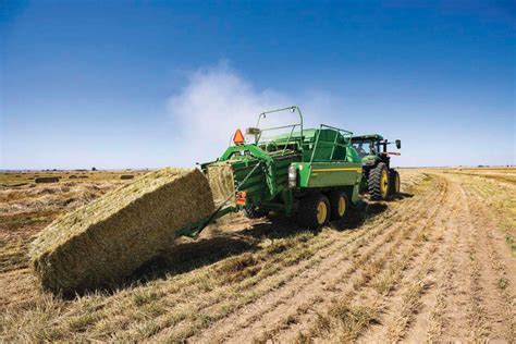The SIPMA Z-224 high-density baler working in a field