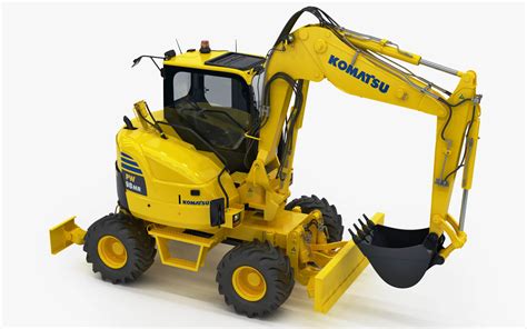 Zdjęcie kabiny Komatsu PW98MR z widocznym panelem sterowania