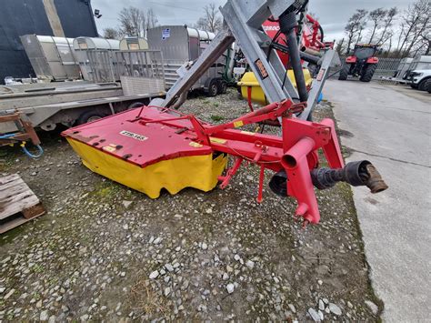 Photo of a Czech ZTR 165 rotary mower attached to a tractor