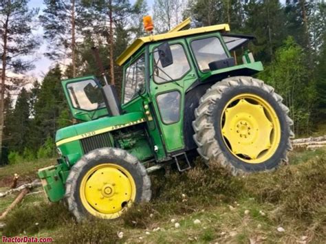 The John Deere 1130 tractor at work in a field, showing its robust construction