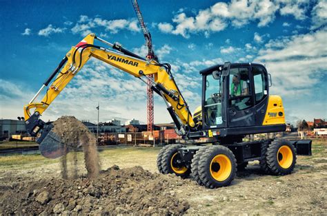Thematic photo of Yanmar B75W wheeled excavator at a construction site