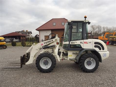 fotografia ładowarki kołowej Terex TL70S w akcji