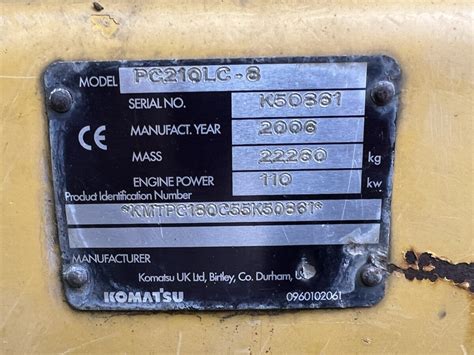Technical drawing or infographic showing key specifications of Komatsu PC210LC-8