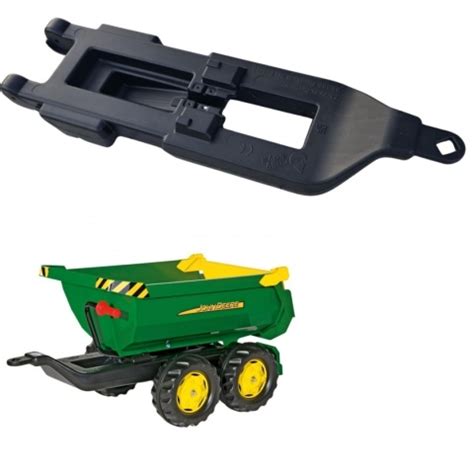 Asortyment akcesoriów Rolly Toys, takich jak przyczepy i dodatki