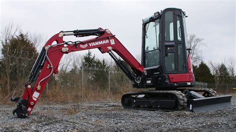 Thematic photo of a Yanmar mini excavator working in a tight space