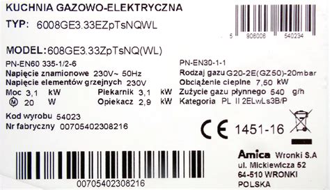 Tabliczka znamionowa minikoparki Bobcat z widocznym numerem modelu i numerem seryjnym