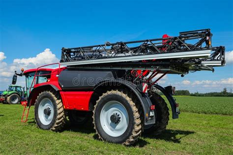 Thematic photo of a modern Caruelle sprayer working in the field