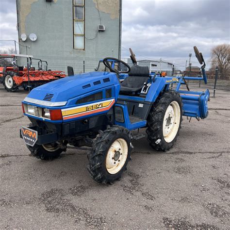Thematic photo of an Iseki Landhope 185 tractor at work
