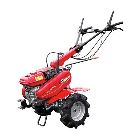 Ciągnik jednoosiowy Honda F 560 C z kosiarką bijakową w akcji