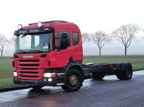 Thematic photo of a white Scania P270 truck with a tipper and HDS working on a construction site
